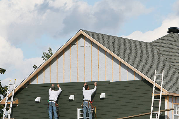 Professional Siding Installation technician working in Harrison, OH